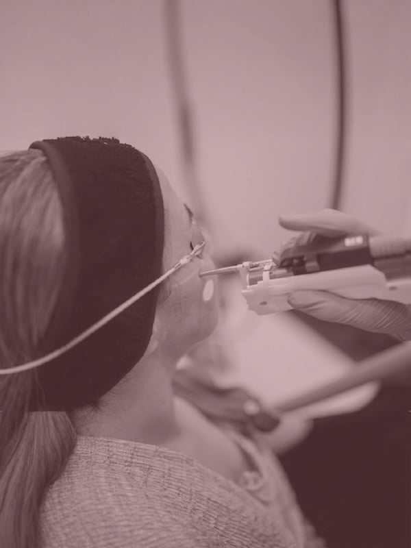 Cosmetic dermatology patient during facial rejuvenation treatment at The Dermatology and Laser Group in New York City